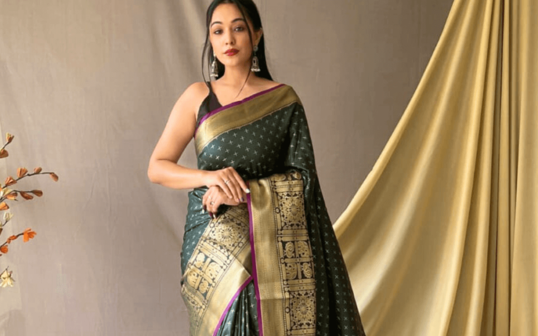 Dark Green Saree with a Golden Border