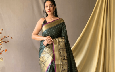 Radiant the Charm of a Dark Green Saree with a Golden Border